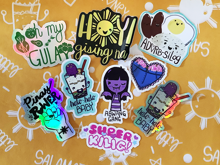 A bunch of different stickers scattered on a table